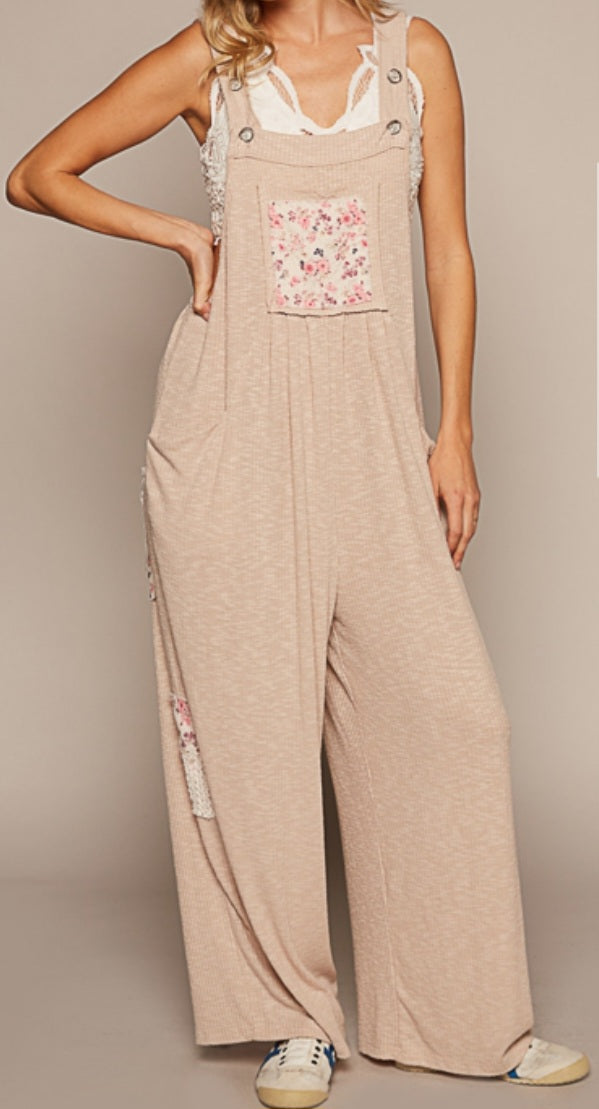 RIBBED JUMPSUIT WITH ADJUSTABLE BUTTON STRAP